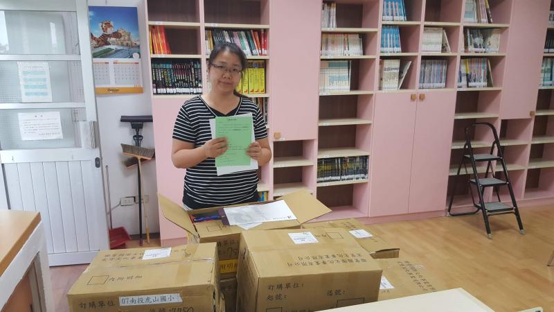 1.主驗人員，註冊圖書組長陳美玲