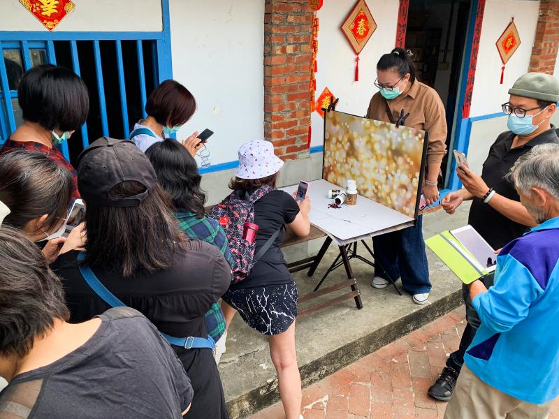 攝影師指導商品攝影的背景應用