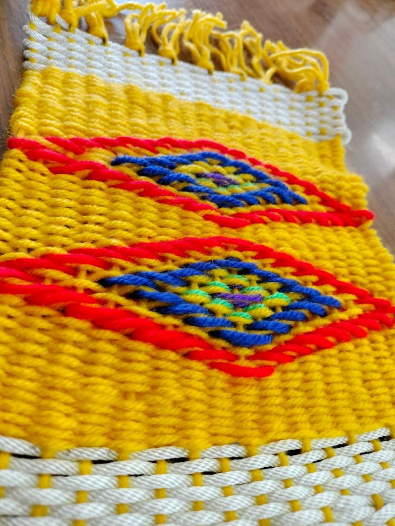 織物成為具有獨特藝術價值的作品。